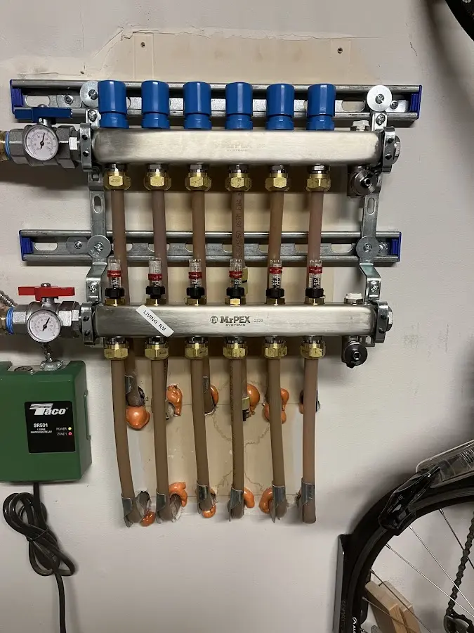 Plumber performing Water Heater Repair at a residential property in Edinburg